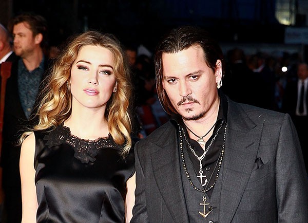 Amber Heard, conhecida principalmente como ex-mulher de Johnny Depp, f