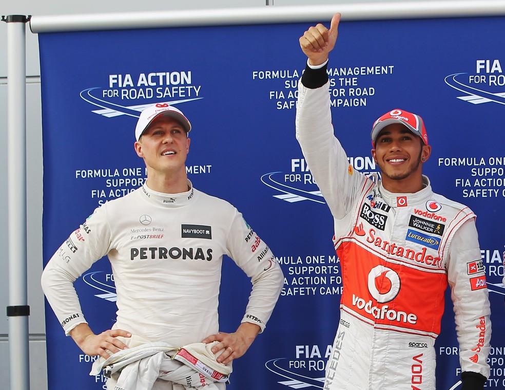 Schumacher ao lado de Hamilton na temporada de 2012 — Foto: Getty Images