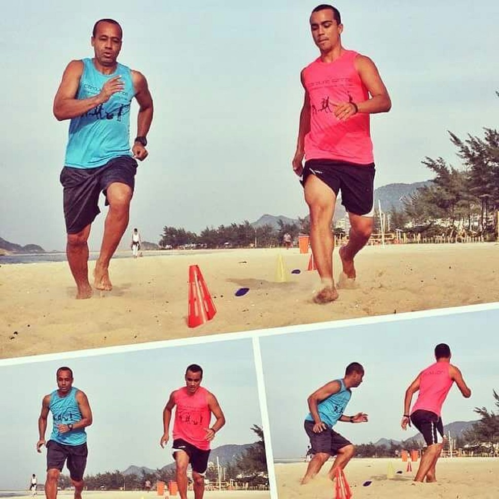 Ao lado do filho Chrys, A&iacute;lton curte uma praia (Foto: Carolina Ferraz)