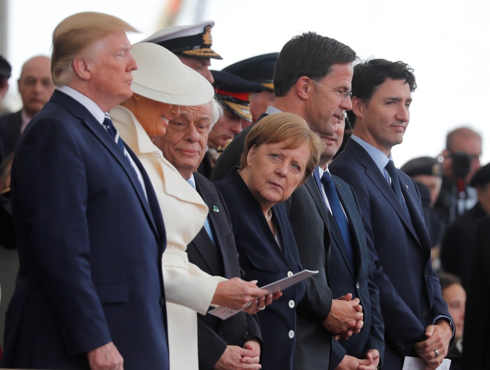 O presidente americano, Donald Trump, a chanceler alemã, Angela Merkel, e o primeiro-ministro do Canadá, Justin Trudeau, participaram das celebrações pelo "Dia D" em Portsmouth, na Inglaterra nesta quarta-feira (5). — Foto: Carlos Barria/Reuters