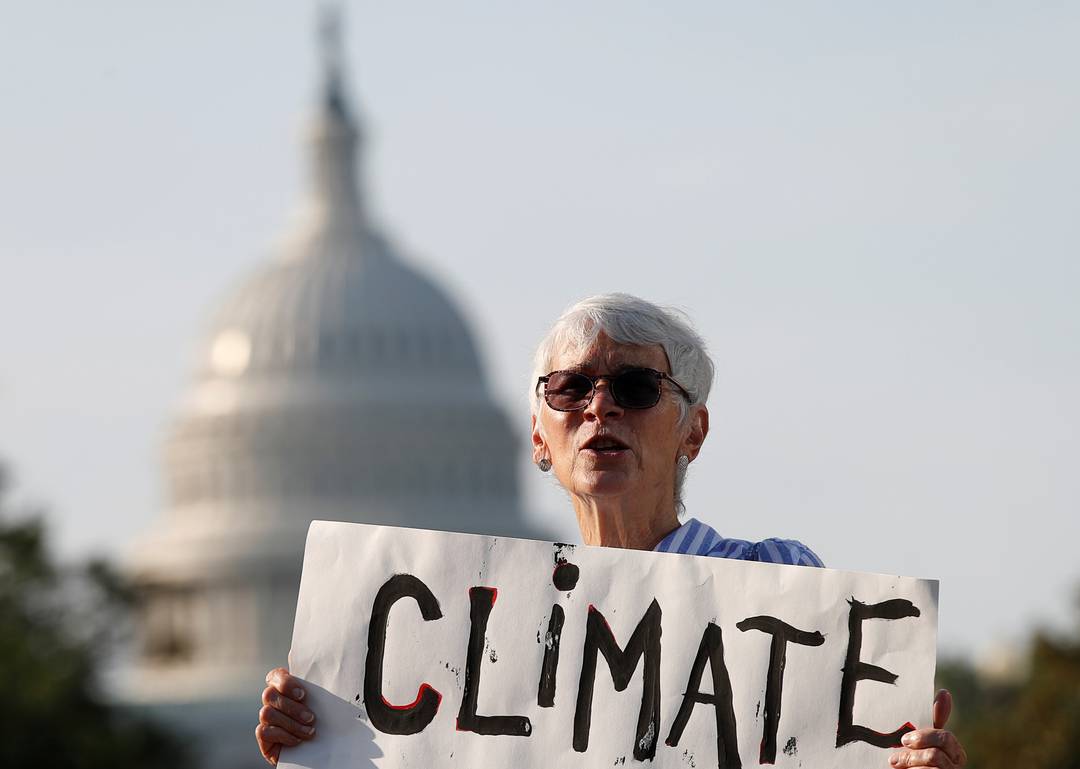 Manifestantes fecham o trÃ¢nsito em Washington em protesto por aÃ§Ãµes contra o aquecimento global
