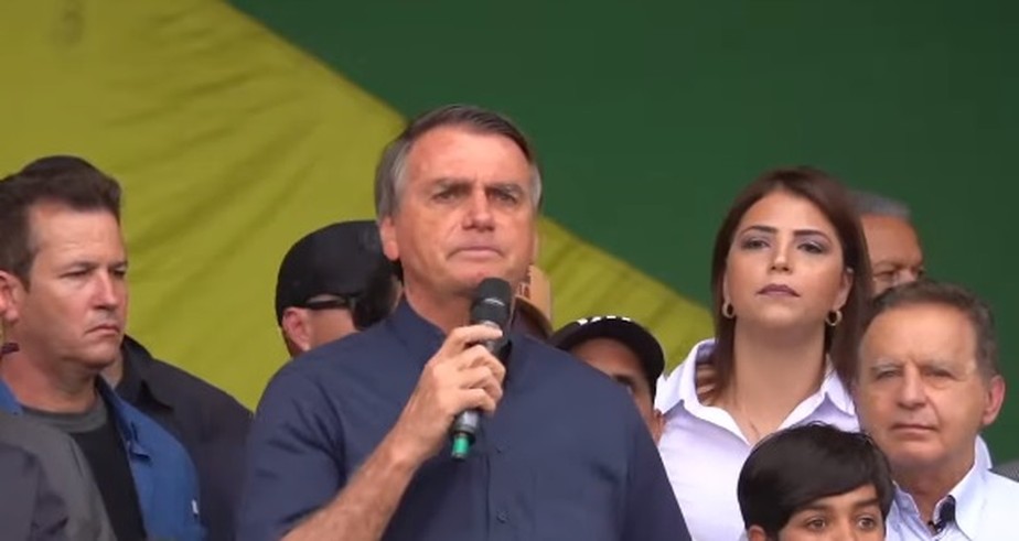 O presidente Jair Bolsonaro discursa durante evento em Betim