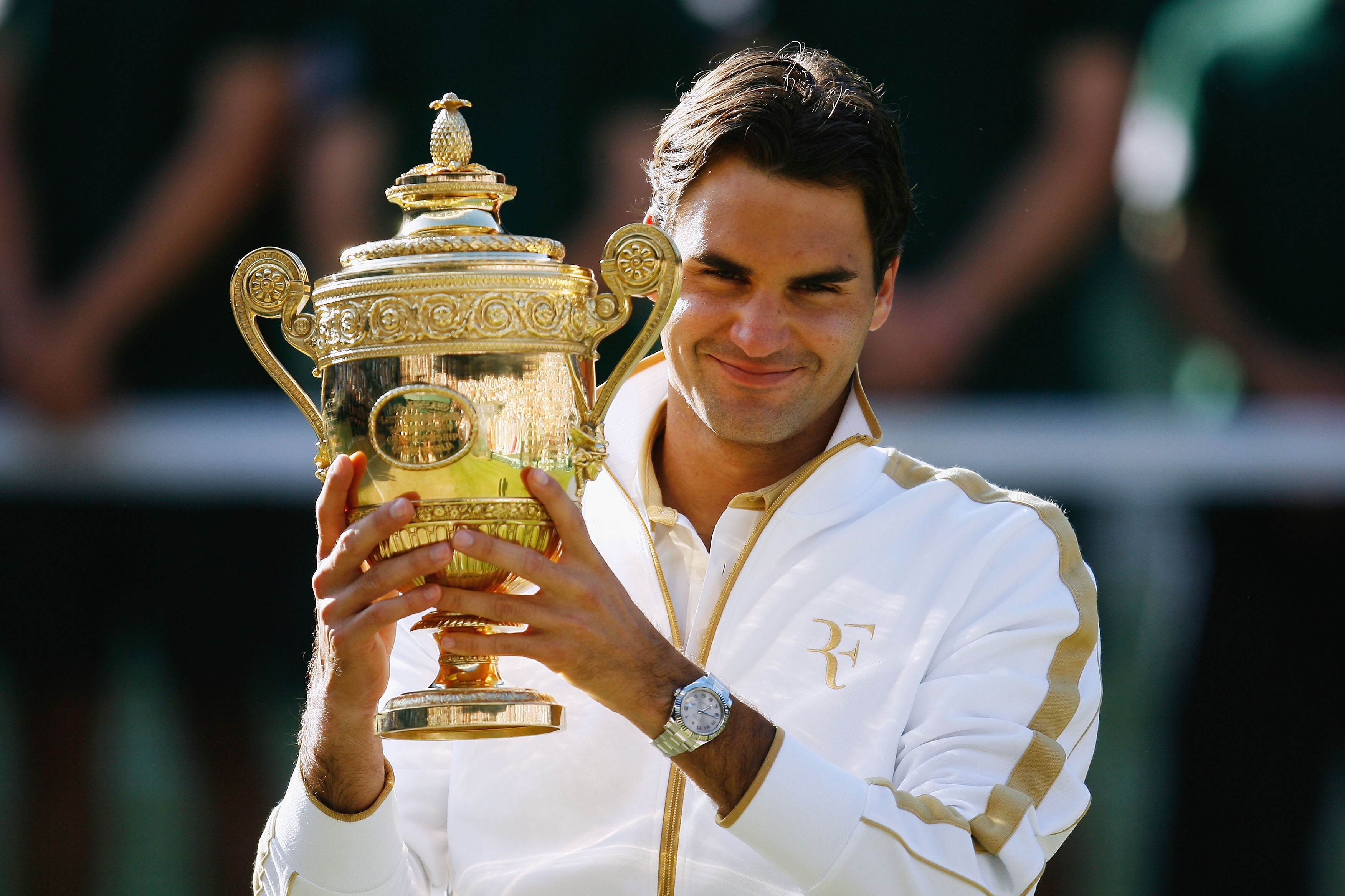 2009年、ウィンブルドンで優勝したフェデラー (Photo: Paul Gilham/Getty Images)