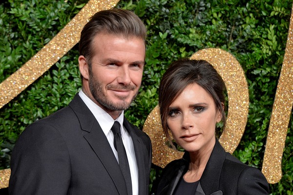 David Beckham e Victoria Beckham em um evento de moda (Foto: Getty Images)