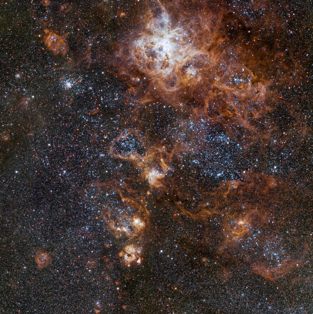 A Nebulosa da Tarântula, a 160.000 anos-luz de distância da Terra, uma das estruturas da Grande Nuvem de Magalhães, uma galáxia satélite da nossa Via Láctea. — Foto: ESO