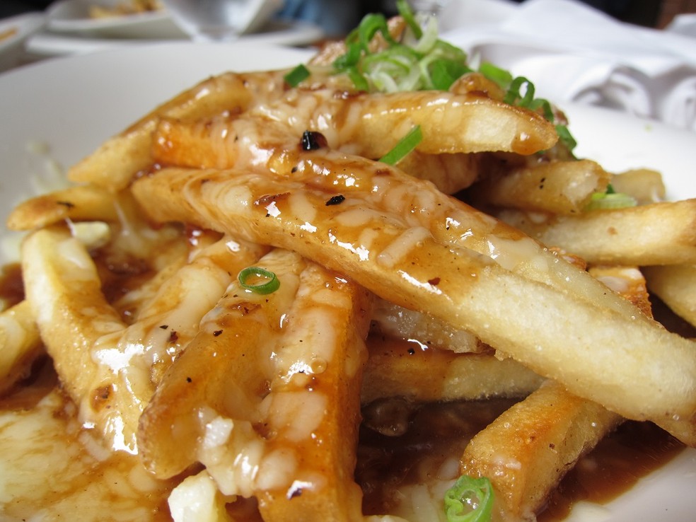 Prato típico do Canadá, o Poutine tem suas origens em Quebec — Foto: Flickr / Jon Campbell / CreativeCommons