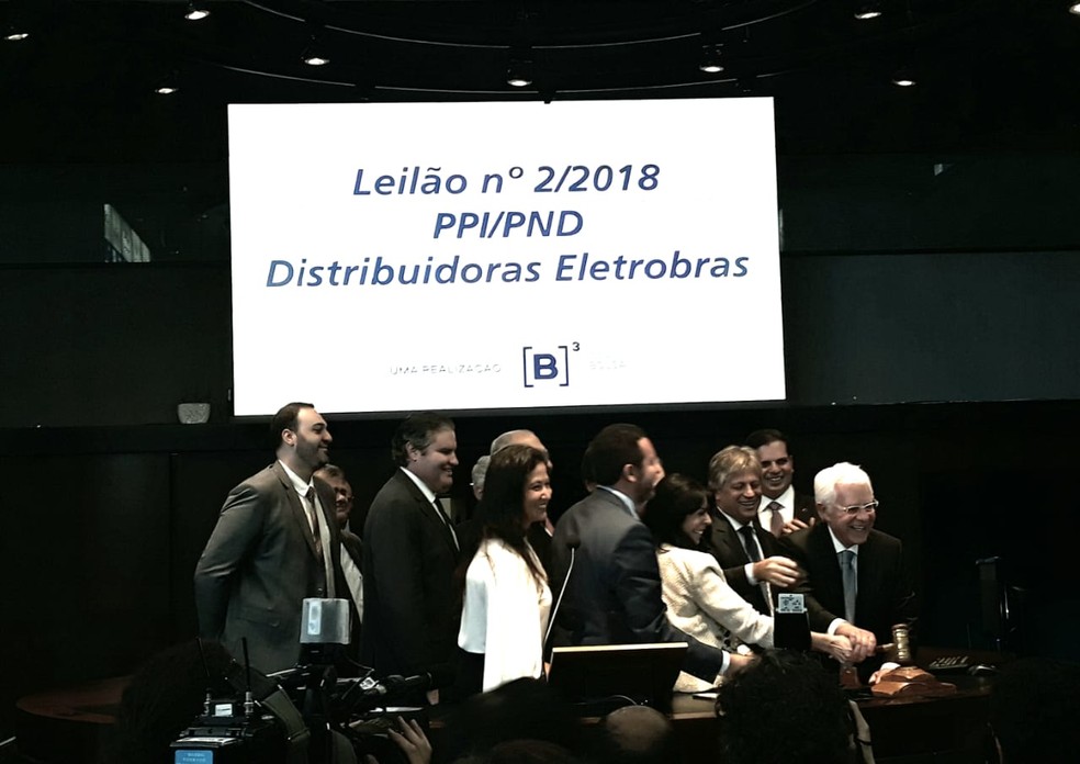 Representantes da Energisa na cerimônia de batida de martelo na B3 (Foto: Taís Laporta)