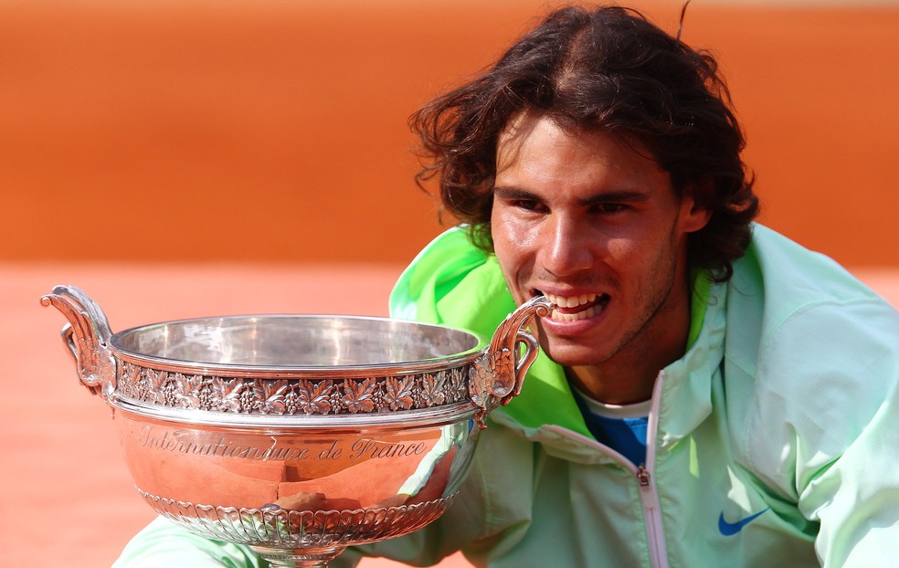 Em 2009, Nadal caiu nas oitavas. Mas voltou com tudo em 2010 e levou o penta sobre o sueco Robin Soderling; — Foto: Getty Images 