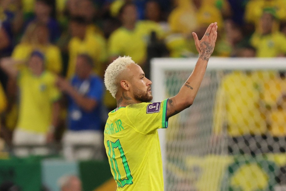Brazil's forward #10 Neymar celebrates scoring his team's first goal during the Qatar 2022 World Cup quarter-final football match between Croatia and Brazil at Education City Stadium in Al-Rayyan, west of Doha, on December 9, 2022