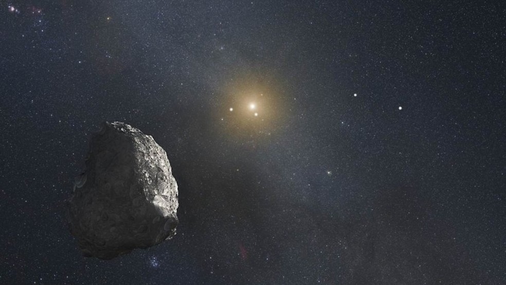  Concepção artística de um asteroide no cinturão de Kuiper, no limite do nosso Sistema Solar  — Foto: NASA