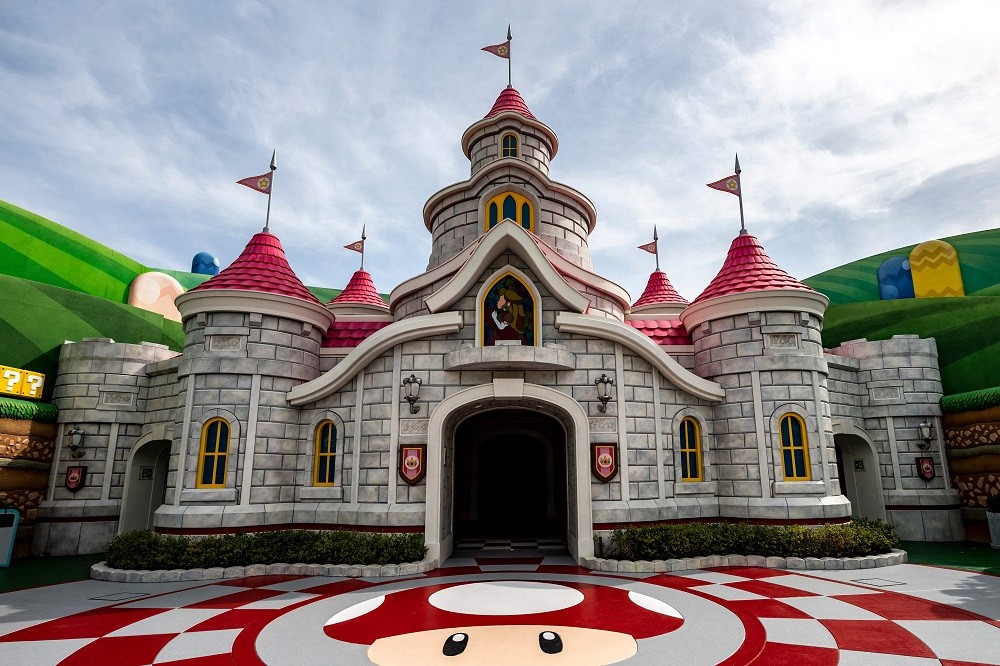 This picture taken on March 17, 2021, shows Peach's Castle during a media preview of the Super Nintendo World at Universal Studios Japan in Osaka. (Photo by Philip FONG / AFP)AFP