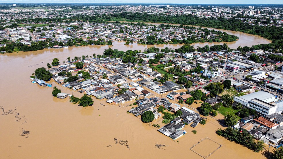  Cerca de 75 mil pessoas foram atingidas pela enchente e mais de 15,4 mil que tiveram que deixar suas casas em Rio Branco — Foto: Marcos Vicentti/Secom