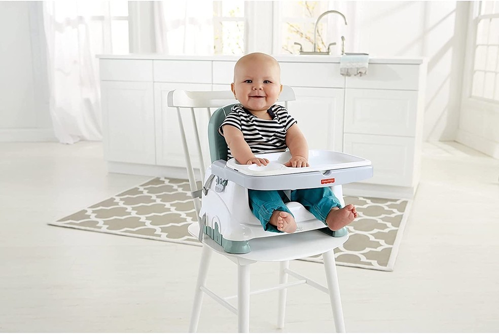 Bebê em cadeira de alimentação sorrindo (Foto: Divulgação/Fisher-Price)