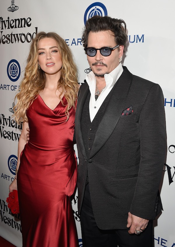 O ator Johnny Deppe e a atriz e modelo Amber Heard (Foto: Getty Images)