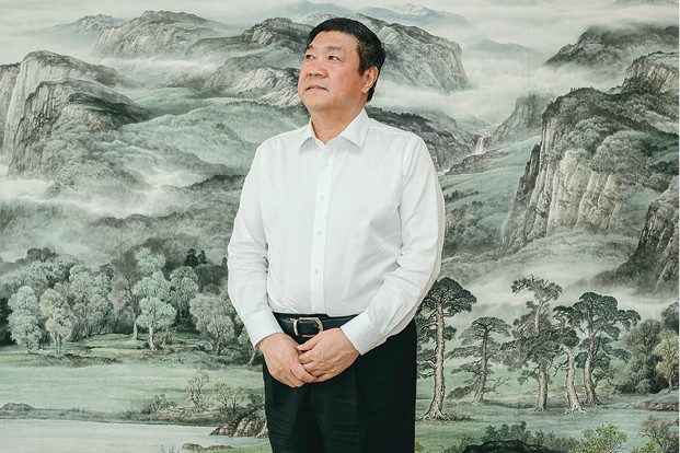 BILIONÁRIO VERDE: O empreendedor chinês Wang Wenbiao, fundador do grupo Elion, fez fortuna arborizando seu país (Foto: Ian Teh/Panos Pictures)