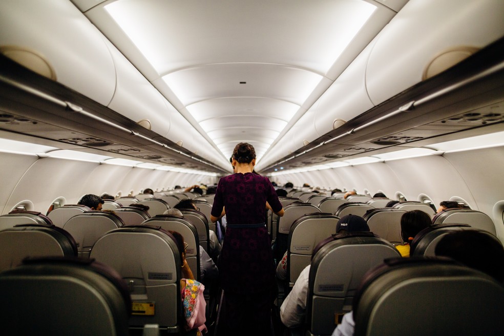 Passageiros em avião — Foto: Kelly/Pexels