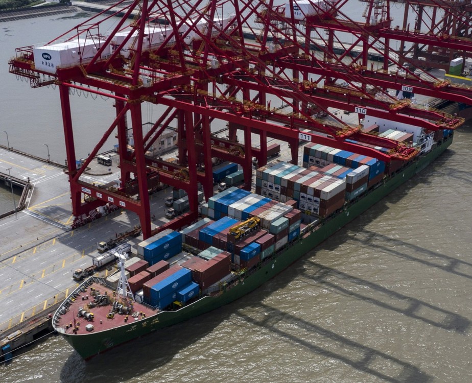 China amplia sua fatia no comércio global