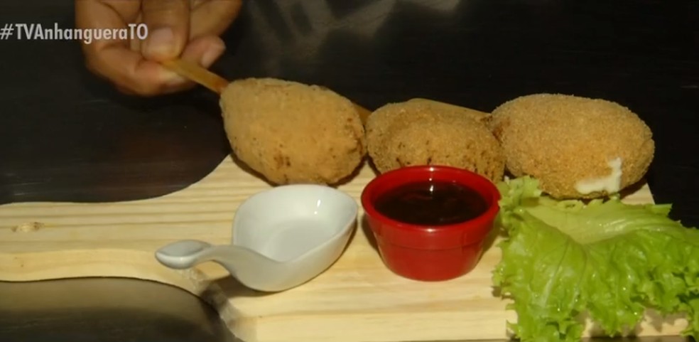 Picolé de costela é uma das apostas na edição do Festival Gastronômico de Taquaruçu — Foto: TV Anhanguera/Reprodução