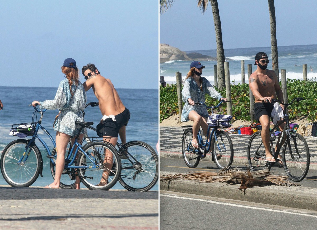 Rômulo Arantes é clicado com a namorada em passeio de bicicleta (Foto: Daniel Delmiro / AgNews)