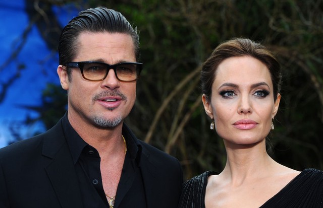 LONDON, ENGLAND - MAY 08:  Brad Pitt and Angelina Jolie attend a private reception as costumes and props from Disney's "Maleficent" are exhibited in support of Great Ormond Street Hospital at Kensington Palace on May 8, 2014 in London, England.  (Photo by (Foto: Getty Images)