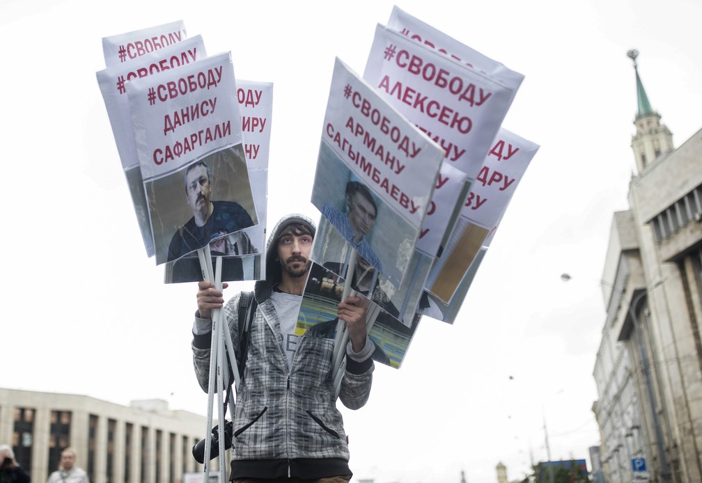 ONG aproveitam proximidade da Copa para chamar atenção à situação dos direitos humanos na Rússia (Foto: Evgeny Feldman/AP)