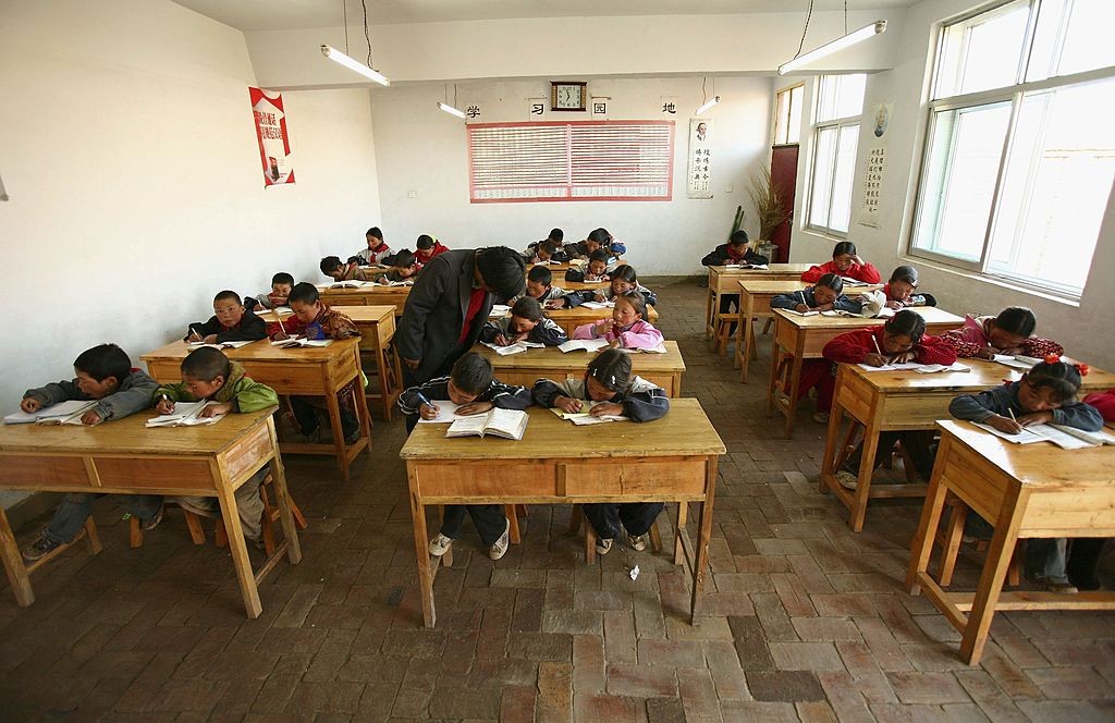 Crianças em escola na China (Foto:  China Photos/Getty Images)