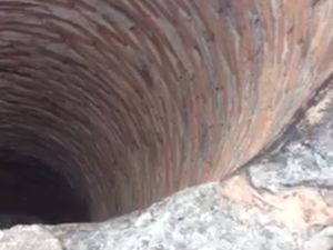 Corpo estava dentro desta cisterna que foi desativada há 20 anos (Foto: Divulgação/PM)