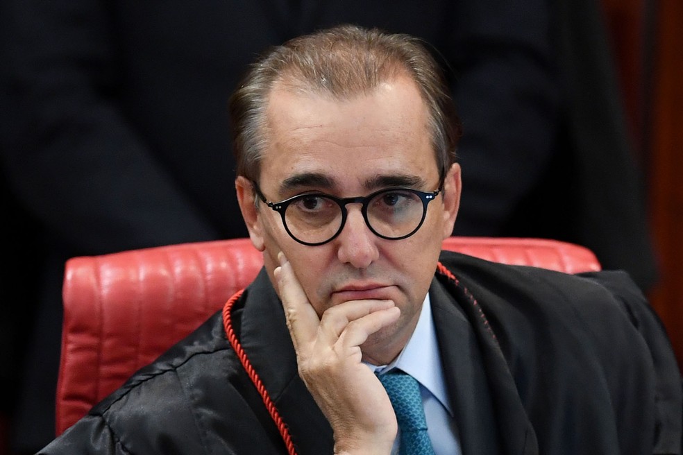O Ministro Admar Gonzaga durante julgamento da chapa Dilma-Temer, em Brasília (Foto: Evaristo Sa/AFP)