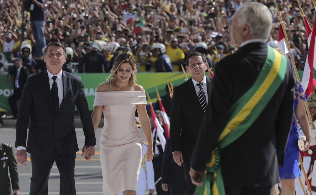 Bolsonaro chega ao Planalto para receber a faixa presidencial  — Foto: Evaristo Sá/AFP