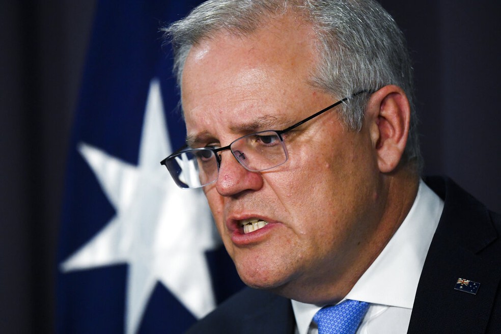 Scott Morrison, primeiro-ministro da Austrália, fala em coletiva de imprensa em Canberra em 12 de novembro — Foto: Lukas Coch/AAP Image via AP