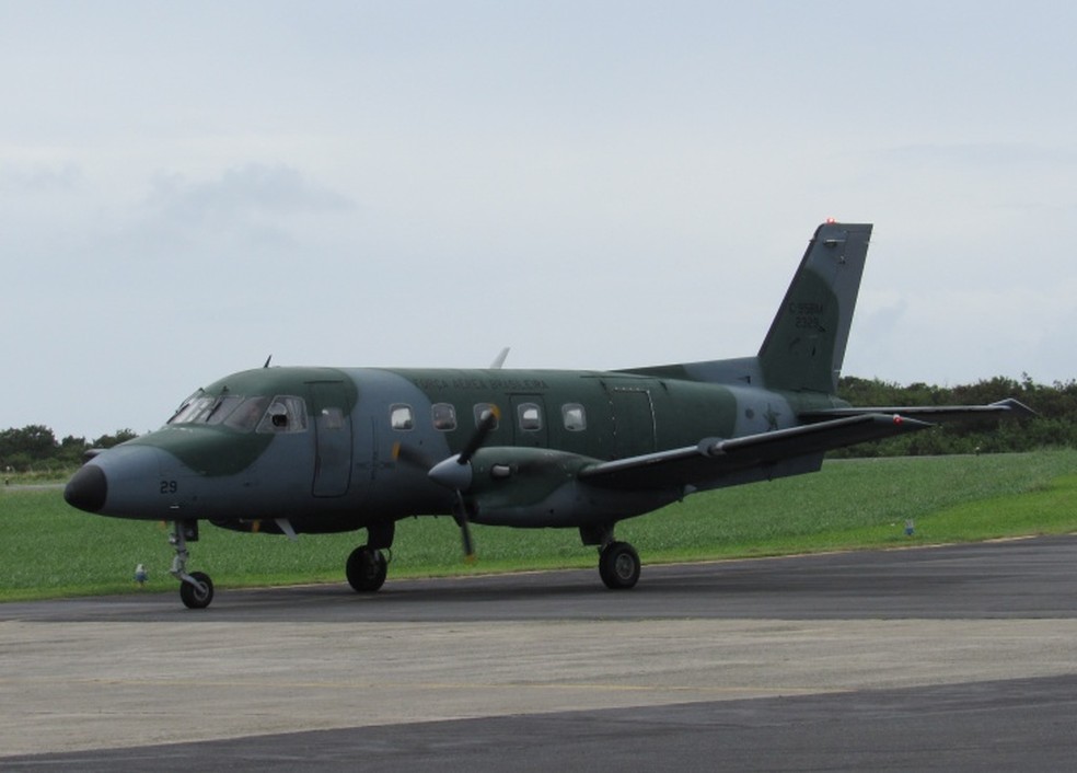 O aviÃ£o da FAB fez o transporte dos pacientes  (Foto: Ana Clara Marinho/TV Globo )