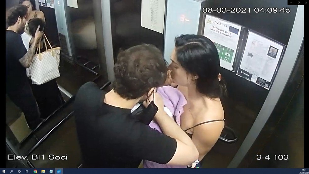 Caso Henry: vídeo mostra Monique e Jairinho descendo de elevador com o menino a caminho do hospital