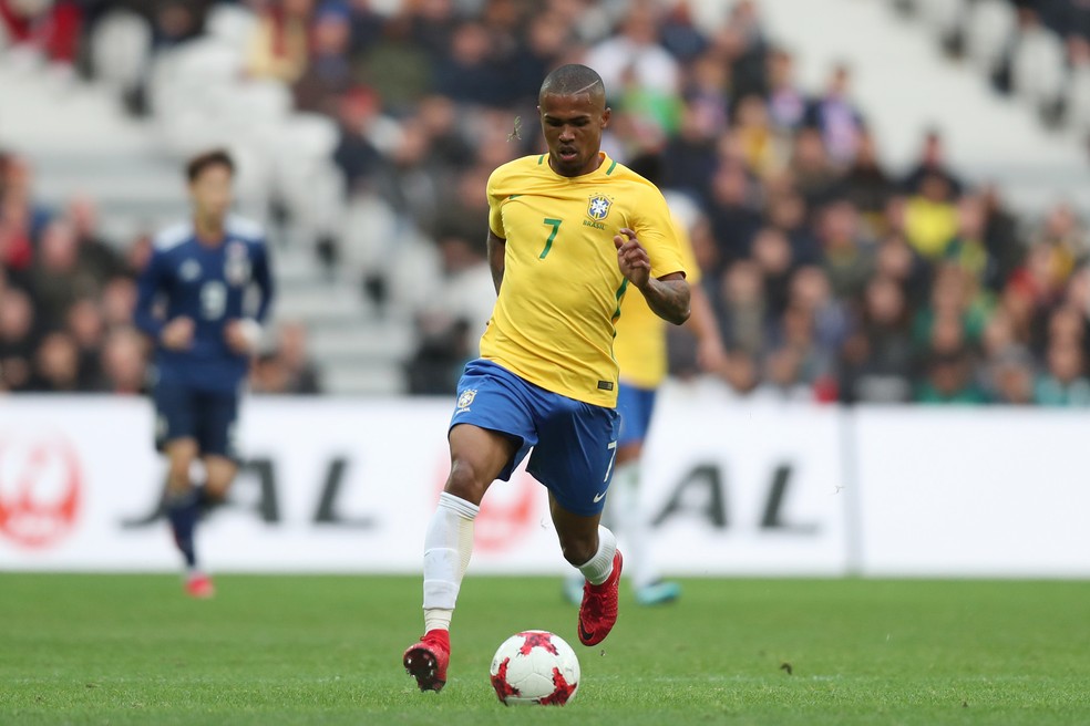 Douglas Costa disputou a Copa de 2018, na Rússia — Foto: Lucas Figueiredo/CBF
