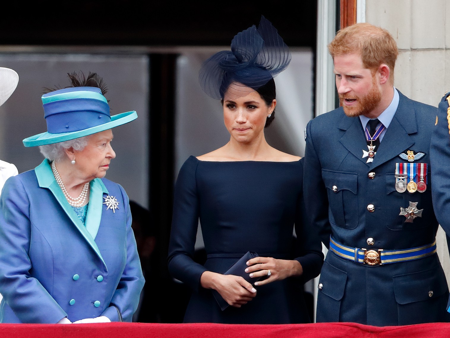 Rainha Elizabeth II, Meghan Markle e o príncipe Harry (Foto: Getty Images)