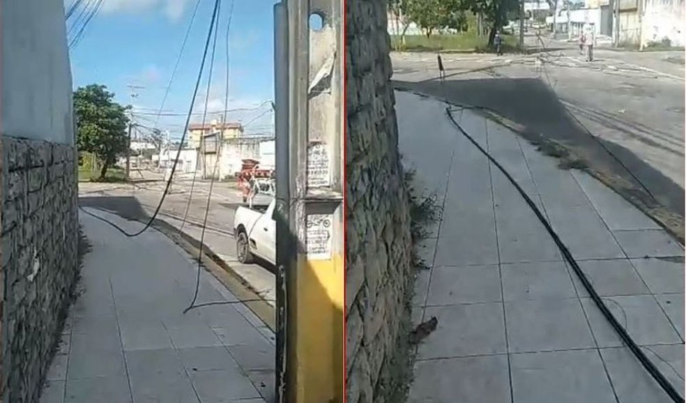 Fiação de telefonia ficou pendurada na via após rompimento provocado pelo caminhão. — Foto: Reprodução