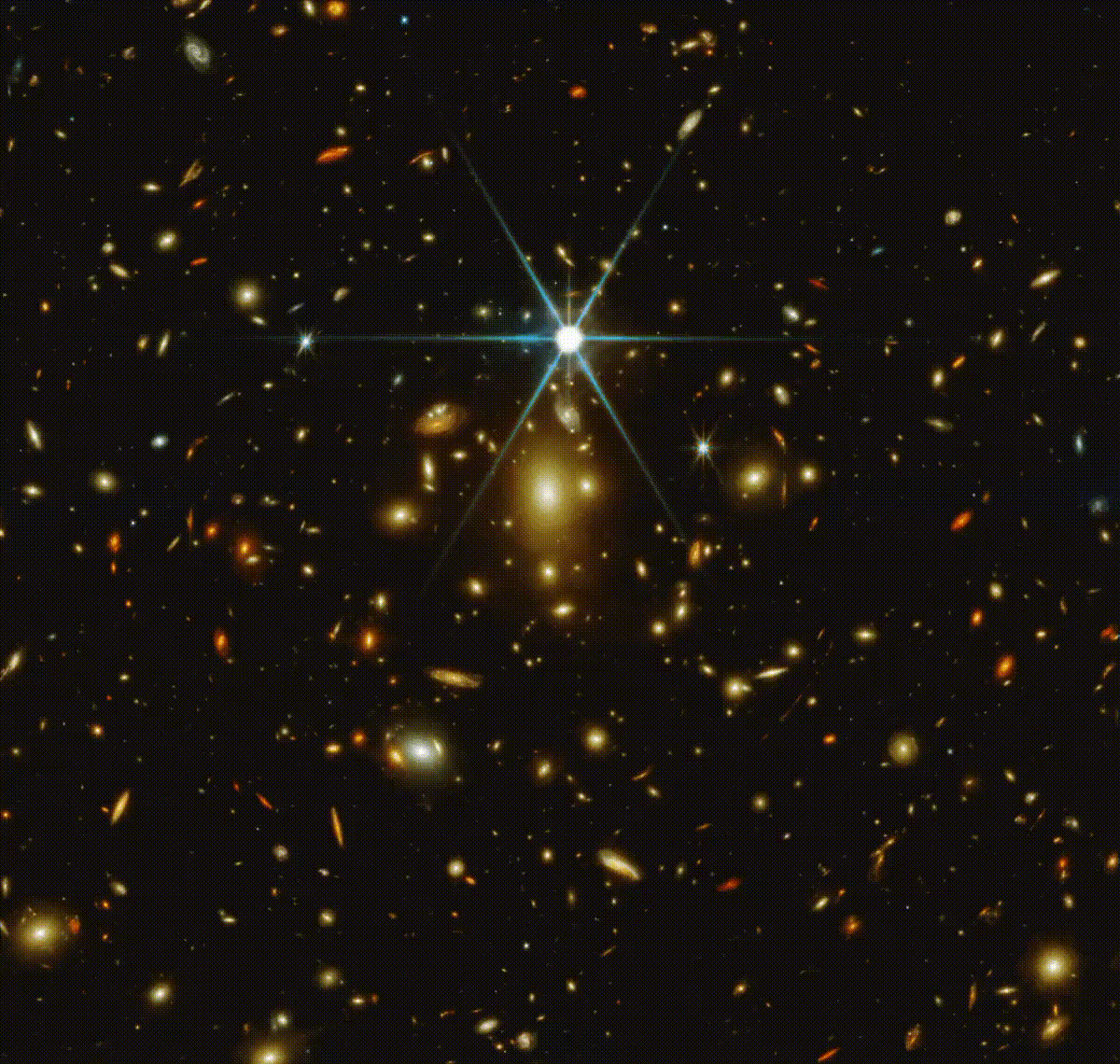 Galáxias brilham e aparecerem enquanto a imagem do Hubble desaparece na imagem do Telescópio James Webb registrada no mesmo aglomerado de galáxias (Foto: @CosmicSprngJWST/Twitter/Reprodução)