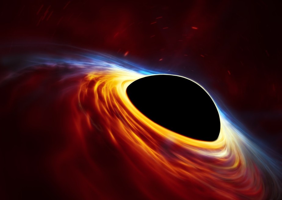 Impressão artística de buraco negro supermassivo com estrela dilacerada