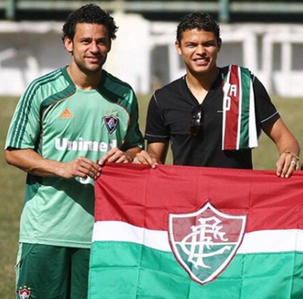 Thiago Silva ao lado de Fred: zagueiro saiu do clube pouco antes da chegada do atacante — Foto: Divulgação