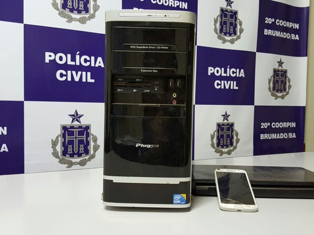 Computador e celular foram apreendidos com suspeito (Foto: Divulgação/ Polícia Civil)