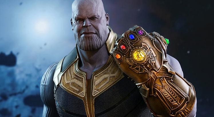 O vilão Thanos usado a manopla com as Joias do Infinito no Universo Cinematográfico Marvel (Foto: Divulgação)