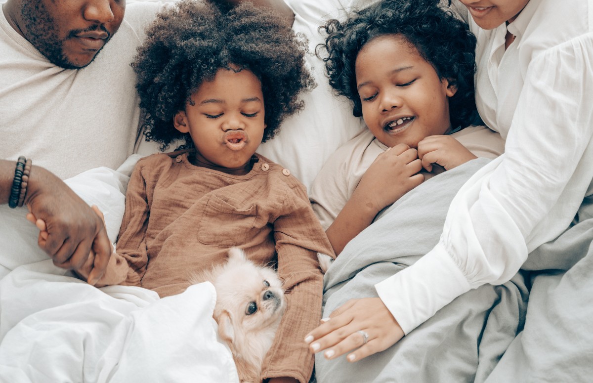 Sharing a bed with animals can help babies sleep (Image: Canva/Creative Commons)