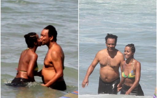 Maju Coutinho troca beijos com marido em praia carioca