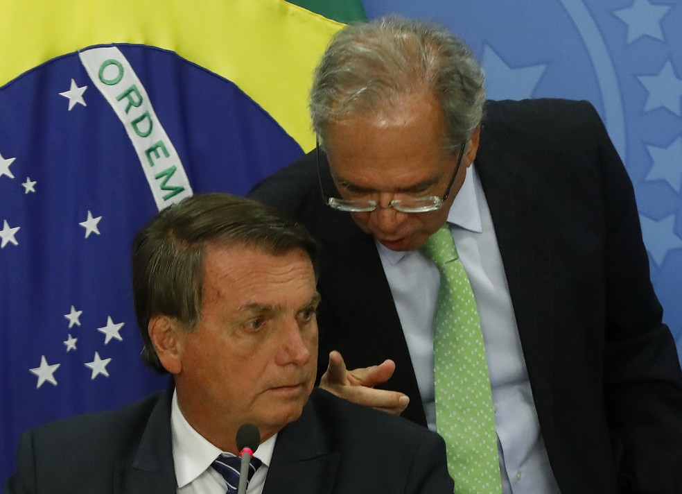 O presidente Jair Bolsonaro e o ministro da Economia, Paulo Guedes  — Foto: Cristiano Mariz/Agência O Globo