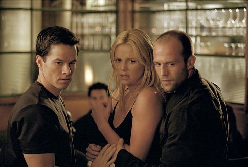 Mark Wahlberg, Charlize Theron e Jason Statham no filme Uma Saída de Mestre (Foto: Divulgação)