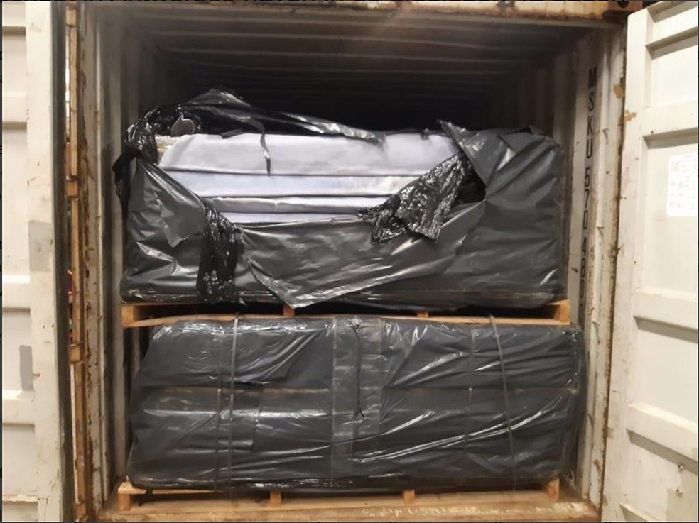 Container com pacotes de cocaína escondidos que foram apreendidos na Bélgica — Foto: Divulgação/Polícia Federal da Bélgica