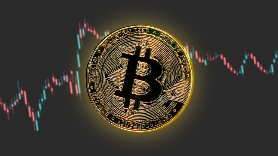 Representação do bitcoin sobre gráfico de candles