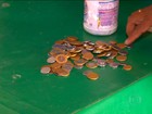 Vendedor comove redes sociais ao juntar R$ 1,8 mil em moedas 