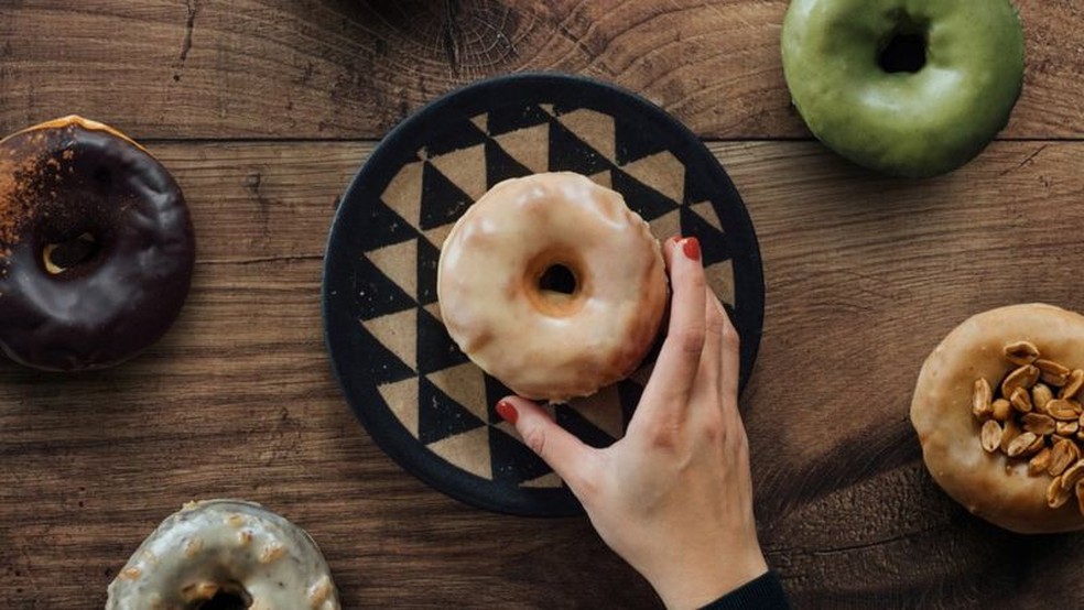 O formato tradicional do donut, com um burado no meio, pode ter nascido em um barco — Foto: Oscar Wong/Getty Images
