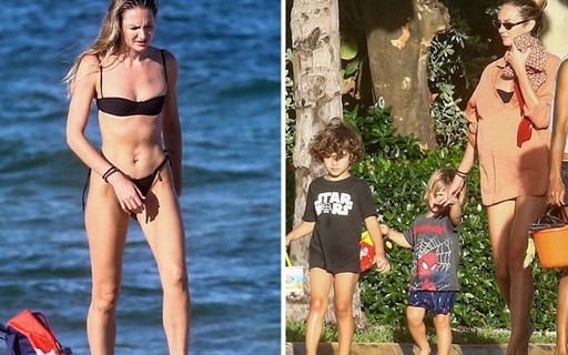 Top Candice Swanepoel vai à praia com os filhos em Miami