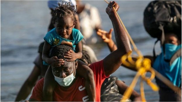 BBC Haitianos dizem não querer voltar a seu país (Foto: Getty Images via BBC)